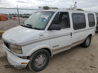 2000 GMC Safari z VIN 1GDDM19W3YB518506, wystawiony jako Copart lot #80923314 z przebiegiem 303 166 mil mil oraz Szkody całkowita. Historia ofert i sprzedaży dostępna na DreamBid. Obrazek 1.