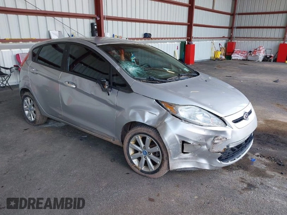 2013 Ford Fiesta SE with VIN 3FADP4EJ2DM173842, listed as a IAAI auction lot 42048262 with 82,637 mi miles. Bid and sale history available at carsss.com. Image 1.