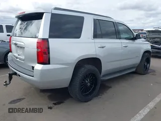 2018 Chevrolet Tahoe LT with VIN 1GNSCBKC2JR115318, listed as a IAAI auction lot 41809253 with 107,217 mi miles and . Bid and sale history available at DreamBid. Image 4.