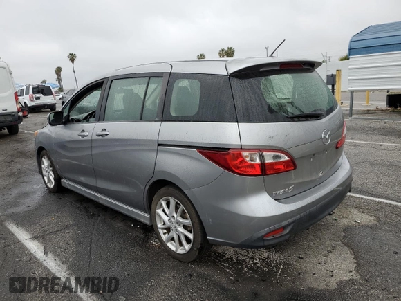 2012 Mazda 5 Touring with VIN JM1CW2CL8C0121599, listed as a Copart auction lot 50520895 with 131,948 mi miles and Salvage title. Bid and sale history available at DreamBid. Image 2.