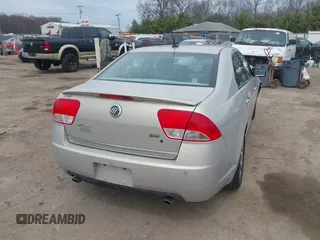 2010 Mercury Milan Premier z VIN 3MEHM0JG5AR651160, wystawiony jako IAAI lot #42043811 z przebiegiem 182 169 mil mil oraz . Historia ofert i sprzedaży dostępna na DreamBid. Obrazek 4.
