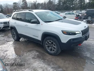 2021 Jeep Cherokee Trailhawk z VIN 1C4PJMBX8MD111326, wystawiony jako IAAI lot #41639941 z przebiegiem 25 552 mil mil oraz . Historia ofert i sprzedaży dostępna na DreamBid. Obrazek 1.