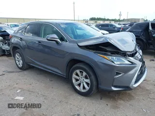 2016 Lexus RX 350 z VIN 2T2ZZMCA4GC032034, wystawiony jako IAAI lot #42095974 z przebiegiem 57 195 mil mil oraz . Historia ofert i sprzedaży dostępna na DreamBid. Obrazek 1.