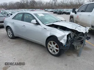 2009 Cadillac CTS RWD z VIN 1G6DF577090137990, wystawiony jako IAAI lot #40360386 z przebiegiem 105 534 mil mil oraz . Historia ofert i sprzedaży dostępna na DreamBid. Obrazek 1.