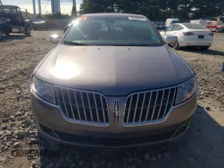 2012 Lincoln MKZ z VIN 3LNHL2JC0CR823283, wystawiony jako Copart lot #43361965 z przebiegiem 128 053 mil mil oraz Szkoda całkowita • Salvage title. Historia ofert i sprzedaży dostępna na DreamBid. Obrazek 5.