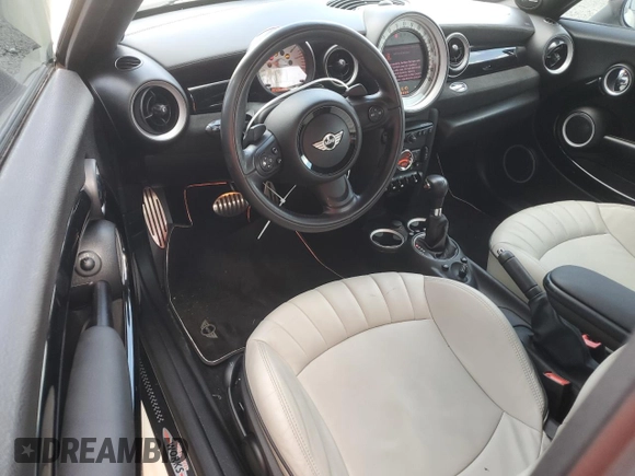 2012 MINI Coupe S z VIN WMWSX3C56CT154872, wystawiony jako Copart lot #68011264 z przebiegiem 91 650 mil mil oraz Szkody całkowita. Historia ofert i sprzedaży dostępna na DreamBid. Obrazek 8.