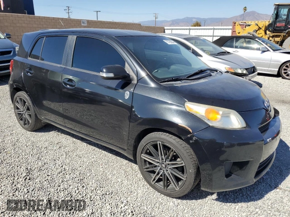 2012 Scion xD with VIN JTKKU4B48C1015888, listed as a Copart auction lot 75729064 with 259,012 mi miles and Salvage Title. Bid and sale history available at DreamBid. Image 4.