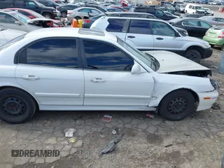 2003 Hyundai Sonata with VIN KMHWF25S13A830754, listed as a IAAI auction lot 41409518 with 207,849 mi miles. Bid and sale history available at carsss.com. Image 14.