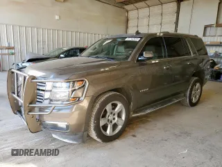 2016 Chevrolet Tahoe LTZ with VIN 1GNSKCKC2GR265978, listed as a Copart auction lot 61742925 with 143,032 mi miles and Salvage title. Bid and sale history available at DreamBid. Image 1.