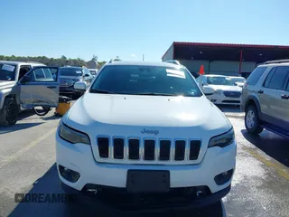 2021 Jeep Cherokee Altitude with VIN 1C4PJLLB5MD173828, listed as a IAAI auction lot 42234912 with 66,400 mi miles and . Bid and sale history available at DreamBid. Image 12.