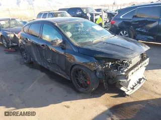 2015 Ford Focus ST with VIN 1FADP3L95FL339181, listed as a IAAI auction lot 41397051 with 124,656 mi miles. Bid and sale history available at carsss.com. Image 1.