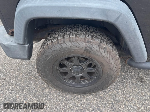 2007 Jeep Wrangler Rubicon with VIN 1J4GA64127L170574, listed as a IAAI auction lot 42474509 with 142,976 mi miles and . Bid and sale history available at DreamBid. Image 6.