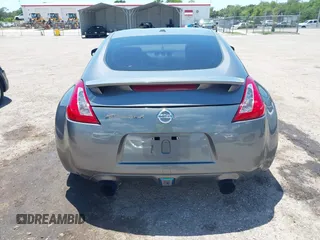 2013 Nissan 370Z Touring z VIN JN1AZ4EH2DM384011, wystawiony jako IAAI lot #42274166 z przebiegiem 87 499 mil mil oraz . Historia ofert i sprzedaży dostępna na DreamBid. Obrazek 16.