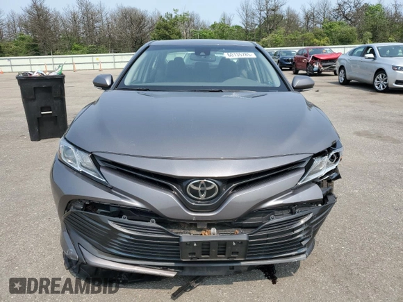 2018 Toyota Camry LE with VIN 4T1B11HK1JU141022, listed as a Copart auction lot 60135785 with 112,652 mi miles and Salvage title. Bid and sale history available at DreamBid. Image 5.