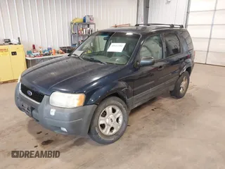 2004 Ford Escape XLT with VIN 1FMYU93134KB36712, listed as a IAAI auction lot 42412101 with 232,340 mi miles and . Bid and sale history available at DreamBid. Image 17.