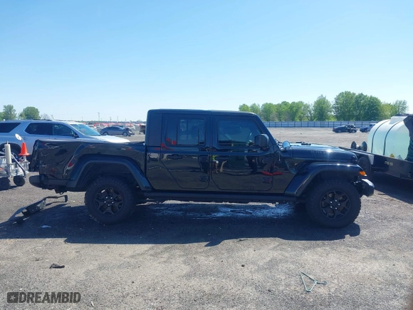 2023 Jeep Gladiator Freedom with VIN 1C6HJTAG1PL526229, listed as a IAAI auction lot 41972084 with 26,021 mi miles. Bid and sale history available at carsss.com. Image 13.