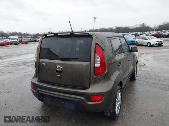2012 Kia Soul + with VIN KNDJT2A67C7426869, listed as a IAAI auction lot 41941698 with 117,815 mi miles. Bid and sale history available at carsss.com. Image 4.