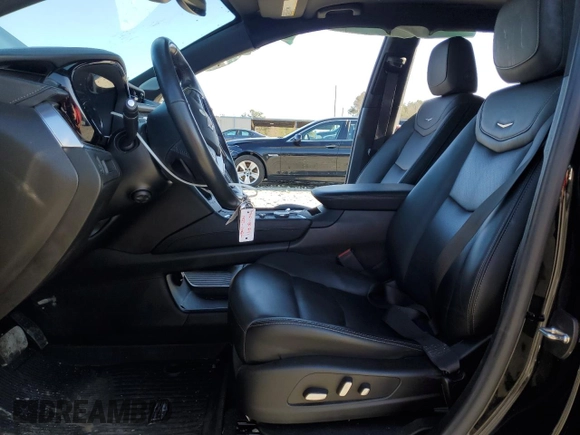 2023 Cadillac XT5 FWD Premium Luxury with VIN 1GYKNCR48PZ132957, listed as a Copart auction lot 42132845 with 27,312 mi miles and Salvage Title. Bid and sale history available at carsss.com. Image 7.