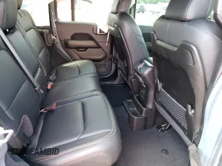 2024 Jeep Wrangler Sahara with VIN 1C4PJXEGXRW269062, listed as a Copart auction lot 64576895 with 2,159 mi miles and Salvage title. Bid and sale history available at DreamBid. Image 11.