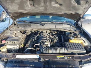 2005 Chrysler 300 with VIN 2C3AA63H65H526016, listed as a IAAI auction lot 41296420 with 136,794 mi miles. Bid and sale history available at carsss.com. Image 10.