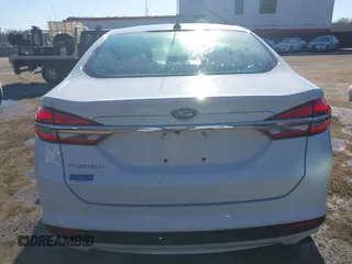 2018 Ford Fusion S with VIN 3FA6P0G77JR229730, listed as a IAAI auction lot 41426559 with 124,568 mi miles. Bid and sale history available at carsss.com. Image 16.