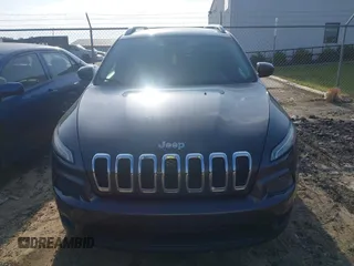 2014 Jeep Cherokee Latitude with VIN 1C4PJLCB6EW241897, listed as a IAAI auction lot 42128880 with 126,242 mi miles. Bid and sale history available at carsss.com. Image 12.