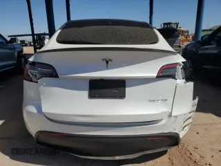 2021 Tesla Model Y Performance z VIN 5YJYGDEF5MF215870, wystawiony jako Copart lot #52531015 z przebiegiem 21 904 mil mil oraz Szkoda całkowita • Salvage title. Historia ofert i sprzedaży dostępna na DreamBid. Obrazek 6.
