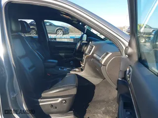 2014 Jeep Grand Cherokee Limited with VIN 1C4RJFBG1EC219721, listed as a IAAI auction lot 41754606 with 146,732 mi miles. Bid and sale history available at carsss.com. Image 5.