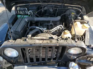 2001 Jeep Wrangler Sport with VIN 1J4FA49S21P339042, listed as a Copart auction lot 56922555 with 113,315 mi miles and Salvage title. Bid and sale history available at DreamBid. Image 12.