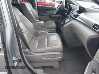 2016 Honda Odyssey EX-L with VIN 5FNRL5H64GB048004, listed as a IAAI auction lot 41676712 with 129,343 mi miles. Bid and sale history available at carsss.com. Image 5.