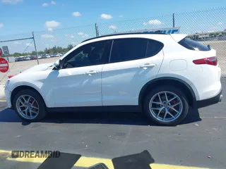 2018 Alfa Romeo Stelvio Ti Sport z VIN ZASFAKNN3J7B95471, wystawiony jako IAAI lot #42320127 z przebiegiem 77 138 mil mil oraz . Historia ofert i sprzedaży dostępna na DreamBid. Obrazek 14.