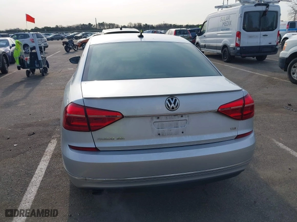 2016 Volkswagen Passat 1.8T SEL with VIN 1VWCT7A3XGC018484, listed as a IAAI auction lot 41763388 with 123,484 mi miles. Bid and sale history available at carsss.com. Image 16.