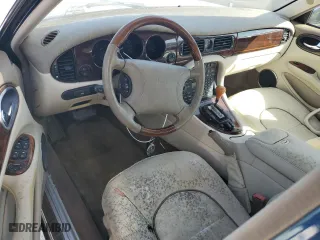 1999 Jaguar XJ with VIN SAJKX6049XC853940, listed as a Copart auction lot 74581244 with 0 mi miles and Salvage Title. Bid and sale history available at carsss.com. Image 8.