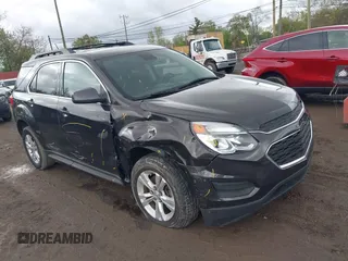 2016 Chevrolet Equinox LT z VIN 1GNALCEKXGZ107352, wystawiony jako IAAI lot #42188055 z przebiegiem 100 061 mil mil oraz . Historia ofert i sprzedaży dostępna na DreamBid. Obrazek 1.