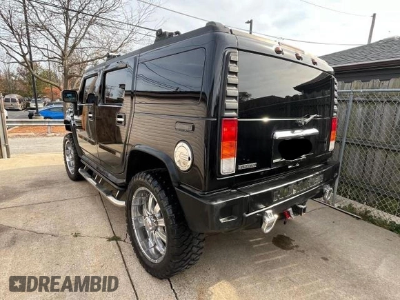 2004 Hummer H2 with VIN 5GRGN23U14H115951, listed as a Copart auction lot 83967054 with 88,845 mi miles and Clean Title. Bid and sale history available at carsss.com. Image 3.