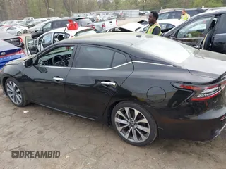 2023 Nissan Maxima Platinum with VIN 1N4AA6FV0PC509933, listed as a IAAI auction lot 41922872 with 11,478 mi miles and . Bid and sale history available at DreamBid. Image 14.