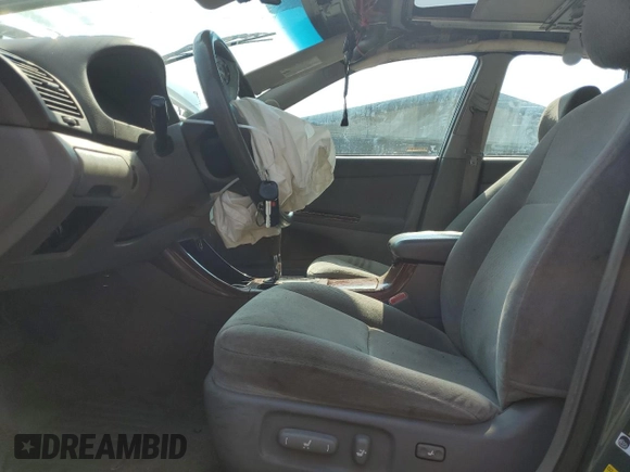 2004 Toyota Camry LE with VIN 4T1BE30K04U290232, listed as a Copart auction lot 59788975 with Not provided miles and Salvage title. Bid and sale history available at DreamBid. Image 7.