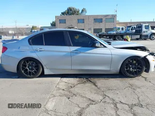 2015 BMW 3 Series 328i with VIN WBA3A5C57FF609054, listed as a IAAI auction lot 41330498 with 129,378 mi miles. Bid and sale history available at carsss.com. Image 13.