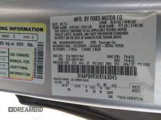 2014 Ford Fusion Titanium with VIN 3FA6P0K93ER163045, listed as a IAAI auction lot 42023862 with 171,543 mi miles. Bid and sale history available at carsss.com. Image 9.