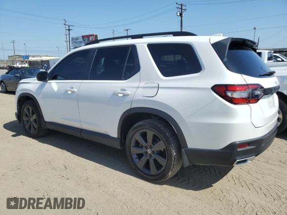 2023 Honda Pilot Sport with VIN 5FNYG2H30PB012041, listed as a Copart auction lot 62038135 with 30,558 mi miles and Salvage title. Bid and sale history available at DreamBid. Image 2.