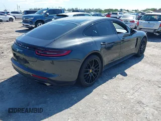 2020 Porsche Panamera 4 E-Hybrid z VIN WP0AE2A79LL132755, wystawiony jako IAAI lot #42040868 z przebiegiem 34 567 mil mil oraz . Historia ofert i sprzedaży dostępna na DreamBid. Obrazek 4.