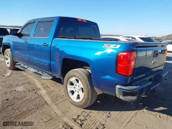 2017 Chevrolet Silverado 1500 LT with VIN 3GCUKREC9HG245776, listed as a IAAI auction lot 41160606 with 104,606 mi miles. Bid and sale history available at carsss.com. Image 3.