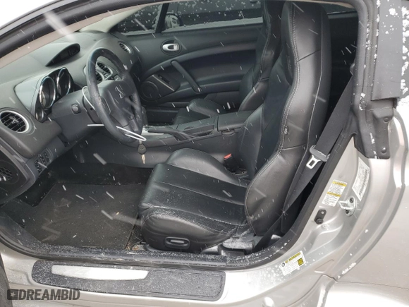 2012 Mitsubishi Eclipse GS with VIN 4A31K5DF9CE006748, listed as a Copart auction lot 84642914 with 74,664 mi miles and Salvage Title. Bid and sale history available at carsss.com. Image 7.
