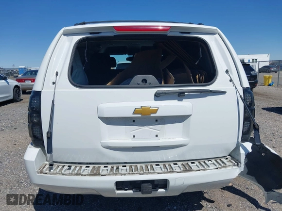 2012 Chevrolet Tahoe LS with VIN 1GNSCAE06CR141256, listed as a IAAI auction lot 41806708 with 105,984 mi miles and . Bid and sale history available at DreamBid. Image 16.
