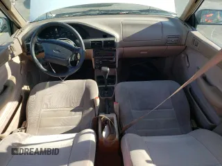 1995 Ford Escort z VIN 3FASP15J0SR164269, wystawiony jako Copart lot #75297324 z przebiegiem 95 548 mil mil oraz Tytuł czysty. Historia ofert i sprzedaży dostępna na DreamBid. Obrazek 8.
