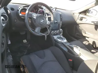 2014 Nissan 370Z Nismo with VIN JN1AZ4EH6EM633797, listed as a Copart auction lot 87879675 with 21,410 mi miles and Salvage Title. Bid and sale history available at DreamBid. Image 8.