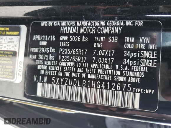 2017 Hyundai Santa Fe 2.4L z VIN 5XYZUDLB1HG412675, wystawiony jako Copart lot #57169045 z przebiegiem 38 947 mil mil oraz Szkoda całkowita • Salvage title. Historia ofert i sprzedaży dostępna na DreamBid. Obrazek 13.