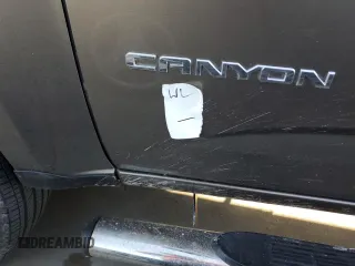 2017 GMC Canyon 2WD SLE with VIN 1GTG5CEA9H1176098, listed as a Copart auction lot 76577424 with 89,220 mi miles and Salvage Title. Bid and sale history available at carsss.com. Image 12.