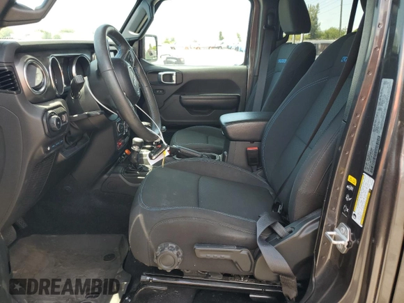 2023 Jeep Wrangler Rubicon z VIN 1C4JJXR65PW557849, wystawiony jako Copart lot #57845705 z przebiegiem 21 849 mil mil oraz Szkoda całkowita • Salvage title. Historia ofert i sprzedaży dostępna na DreamBid. Obrazek 7.