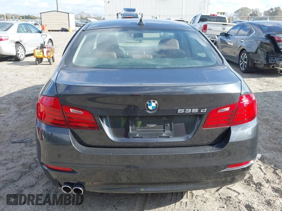 2014 BMW 5 Series 535d with VIN WBAXA5C52ED689245, listed as a IAAI auction lot 41016152 with 95,392 mi miles and . Bid and sale history available at carsss.com. Image 16.